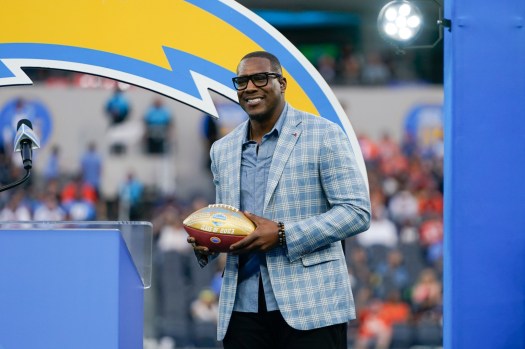 Former Chargers tight end Antonio Gates poses as he is inducted into the Chargers Hall of Fame during halftime in an NFL football game between the Chargers and the Denver Broncos, Sunday, Dec. 10, 2023, in Inglewood, Calif. (AP Photo/Ryan Sun)
