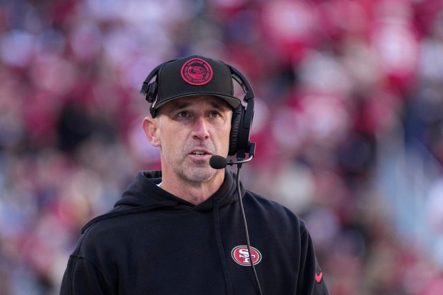 San Francisco 49ers head coach Kyle Shanahan watches action from the sideline during the first half of an NFL football game against the Los Angeles Rams in Santa Clara, Calif., Sunday, Jan. 7, 2024. (AP Photo/Loren Elliott)