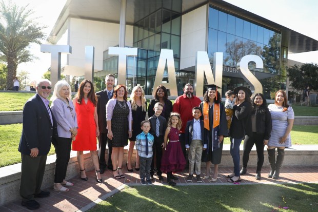 Junely Merwin celebrates her graduation from CSUF in 2019. In addition to her master's degree studies, she now works with a foster youth program at a community college. (Courtesy of Junely Merwin)