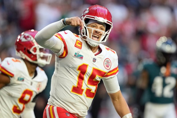 Kansas City Chiefs quarterback Patrick Mahomes (15) celebrates a touchdown against the Philadelphia Eagles during the first half of the NFL Super Bowl 57 football game between the Kansas City Chiefs and the Philadelphia Eagles, Sunday, Feb. 12, 2023, in Glendale, Ariz. (AP Photo/Brynn Anderson)