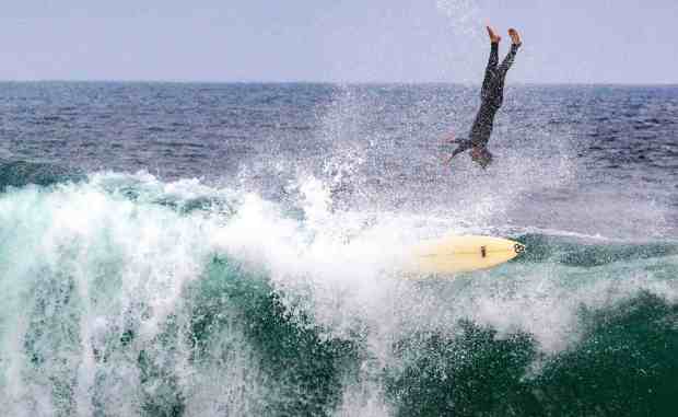 A surfer flies off his board while riding a wave at the Wedge in Newport Beach on Thursday morning, May 18, 2023, as a large swell moved on shore throughout Orange County. (Photo by Mark Rightmire, Orange County Register/SCNG)
