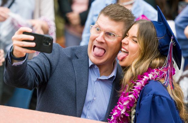 Matt Lawrence and his daughter Jacqueline take a fun selfie following the Beckman High School graduation ceremonies at Northrup Stadium on the Tustin High School campus in Tustin on Wednesday, May 31, 2023. (Photo by Leonard Ortiz, Orange County Register/SCNG)