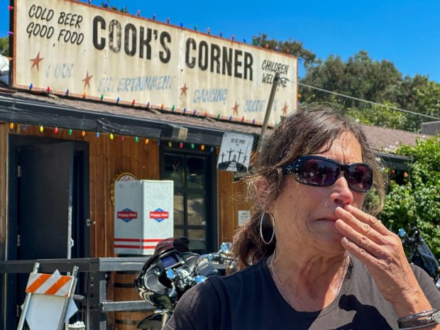Trabuco Canyon, CA - August 25: Nancy Hughes talks about her friend, Marie Snowling, a regular at Cook's Corner, two days after Snowling was shot by her estranged husband, John Snowling, at the bar in Trabuco Canyon, CA, on Friday, August 25, 2023. John Snowling injured his estranged wife, Marie Snowling, but killed three other people in the mass shooting. (Photo by Jeff Gritchen/MediaNews Group/Orange County Register via Getty Images)