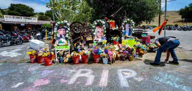 Customers arrive at Cook's Corner bar and restaurant in Trabuco Canyon as it opens for business on Friday, Sepember 1, 2023, following a shooting on August 23, 2023, killing three people and injuring six others. A memorial to the three persons killed stands out front with photographs, notes and flowers.in Trabuco Canyon, CA on Friday, September 1, 2023. (Photo by Mark Rightmire, Orange County Register/SCNG)