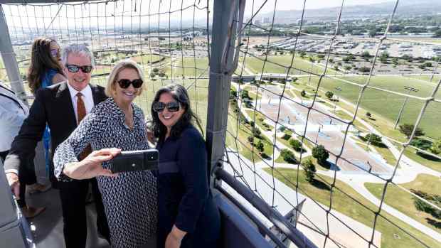 Dan Hedigan, CEO of Five Point, Annette Walker, President of City of Hope Orange County and Irvine Mayor Farrah Khan, from left, take a selfie in the balloon at the Great Park in Irvine, CA on Tuesday, September 26, 2023. The three were part of an event to celebrate the 10th anniversary of the Great Park Neighborhoods. The first Great Park Neighborhood opened in September, 2013 with Pavilion Park. (Photo by Paul Bersebach, Orange County Register/SCNG)