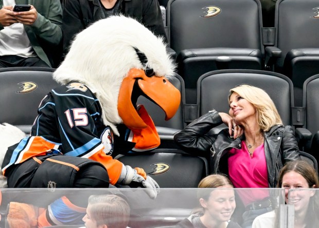 The San Diego Gulls mascot, Gulliver, flirts with a fan during a game between the Ducks and the Stars at the Honda Center in Anaheim on Thursday, October 19, 2023. Mascots from several teams attended the game to celebrate the 30th birthday of the Ducks' mascot, Wild Wing. (Photo by Leonard Ortiz, Orange County Register/SCNG)