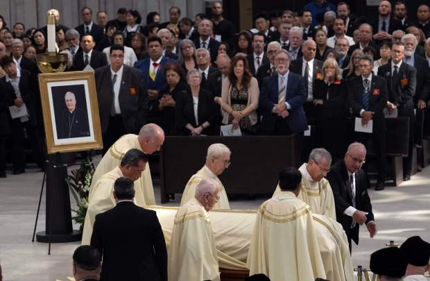 Mourners watch as the casket of Bishop Tod D. Brown is carried out of Christ Cathedral in Garden Grove on Monday, October 30, 2023. Brown led the Diocese of Orange for 14 years. (Photo by Mindy Schauer, Orange County Register/SCNG)