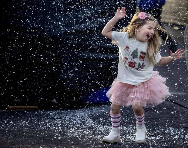 Children find the joy of snow during Winter Fest OC at the OC Fair and Event Center in Costa Mesa on Sunday, November 26, 2023. The festival is open Nov. 24 through Jan. 1. (Photo by Mindy Schauer, Orange County Register/SCNG)