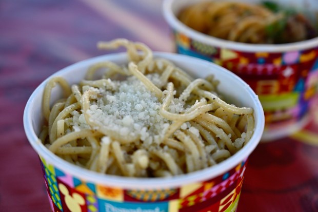 Garlic Noodles: Long noodles tossed in zesty garlic butter with parmesan available at Longevity Noodle Co. during Lunar New Year at Disney California Adventure in Anaheim, CA, on Jan. 20, 2023. (Photo by Jeff Gritchen, Orange County Register/SCNG)