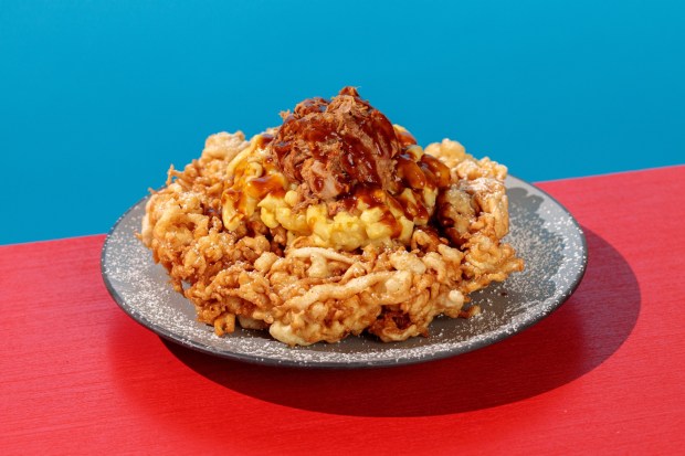 Cornbread Funnel Cake with Mac and Cheese and Pulled Pork with a BBQ Sauce Drizzle served during the Peanuts Celebration at Knott's Berry Farm. (Photo courtesy of Knott's)