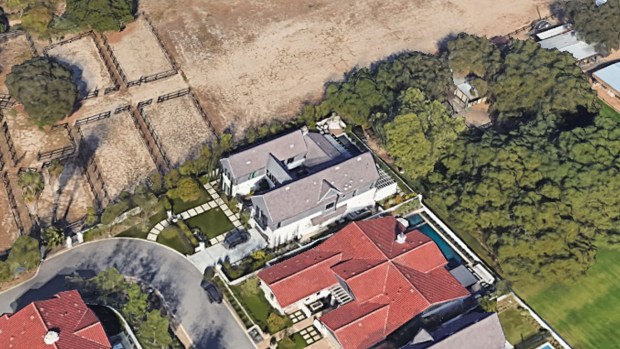 A white San Juan Capistrano home owned by "The Real Housewives of New Jersey" alum Dina Cantin, center. The house is on the market for $4.752 million. (Google Earth)
