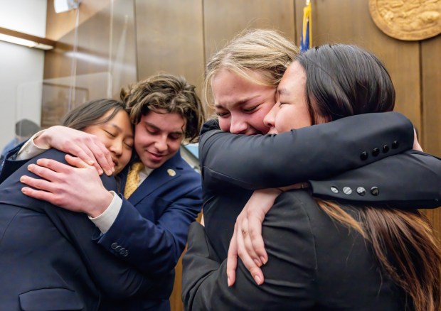 The team from Orange County School of the Arts celebrates after winning the final against El Dorado in the Orange County mock trial competition by the Constitutional Rights Foundation at the Central Justice Center in Santa Ana on Wednesday, February 1, 2023. Pictured, from left, Josie Wang, Toby Izenberg, Emma Kay, and Emily Kim. (Photo by Leonard Ortiz, Orange County Register/SCNG)