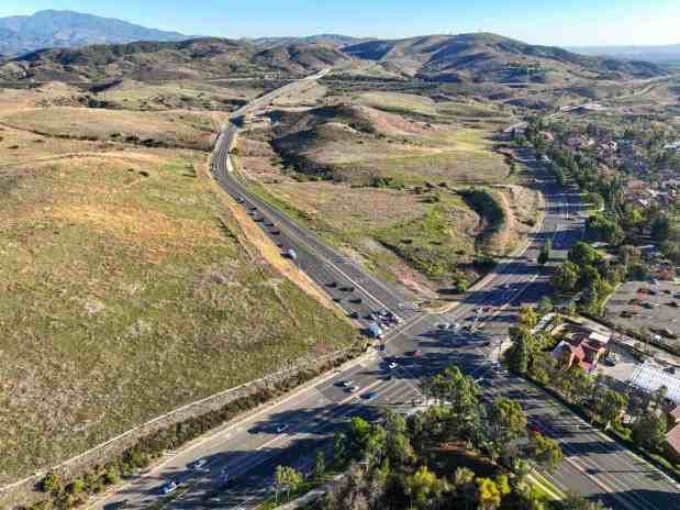 The proposed Orange Heights development looking southeast over the intersection of Jamboree Road and Santiago Canyon Highway in Orange, CA, on Friday, Jan. 5, 2024. Irvine Company's plans to build nearly 1180 homes as part of the Orange Height project. The homes are slated for the undeveloped land between Irvine and Peters Canyon regional parks that is bordered by Jamboree Road on the west, Irvine Regional Park on the north and the 241 and 261 Tollroads on the east. (Photo by Jeff Gritchen, Orange County Register/SCNG)