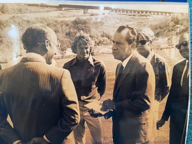 From left to right: Robert Mardian, Rolf Aurness, President Richard Nixon, Tom Craig and Doug Craig. The surfers were giving Nixon an honorary membership to the San Onofre Surfing Club. (Photo courtesy of the Don Craig collection)