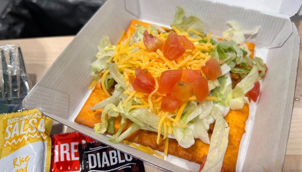 Taco Bell let social media influencers try a tostada made with a giant Cheez-It cracker in its Irvine test kitchen in 2023. (Photo by Fielding Buck, The Press-Enterprise/SCNG)
