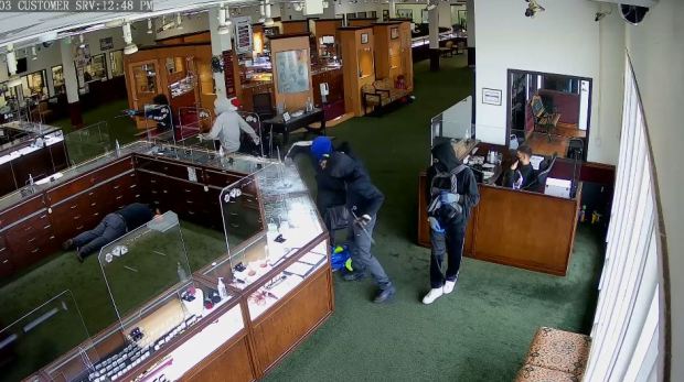 Surveillance video captured a smash and grab robbery at The Jewelry Exchange in Tustin in April 2022. Tustin police have arrested six suspects accused of committing the robbery. (Courtesy of Tustin Police Department)